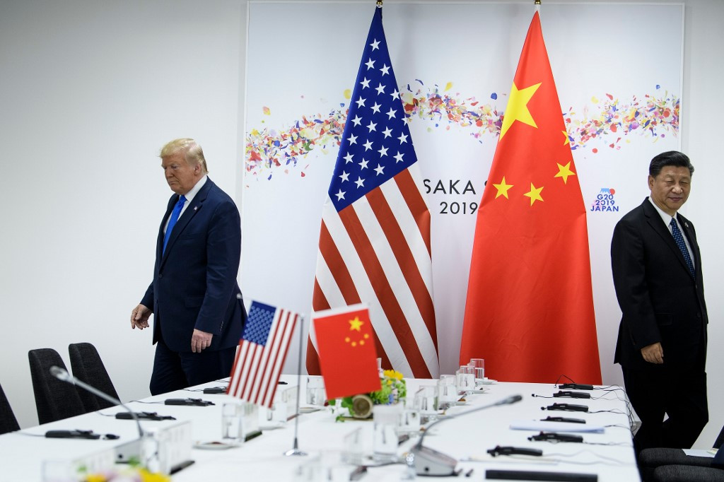 Donald Trump amerikai elnök és Hszi Csin-ping kínai elnök 2019. június 29-én az oszakai G20-csúcstalálkozónFotó: Brendan Smialowski / AFP