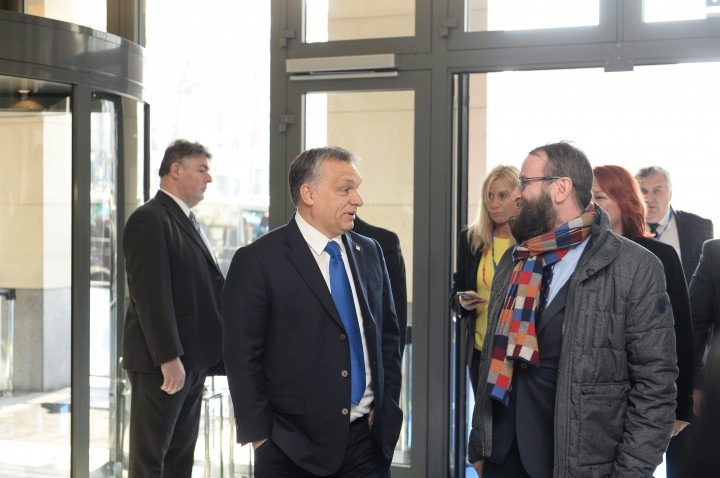 Hungarian Prime Minister Viktor Orbán and former MEP József Szájer talking before the EU summit in Brussels on 17 March 2016. Photo: MTI/EPP