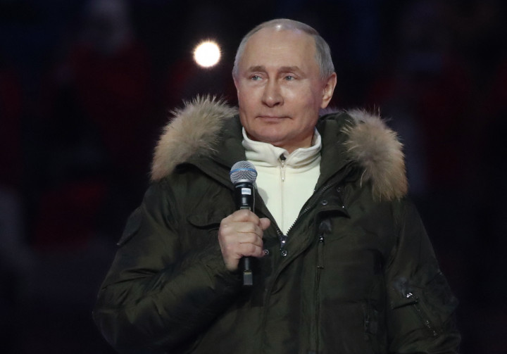 Vlagyimir Putyin a Krím-félsziget Oroszországhoz csatlakozásának hetedik évfordulóját ünneplő koncerten Fotó: Vyacheslav Prokofyev / Sputnik via AFP