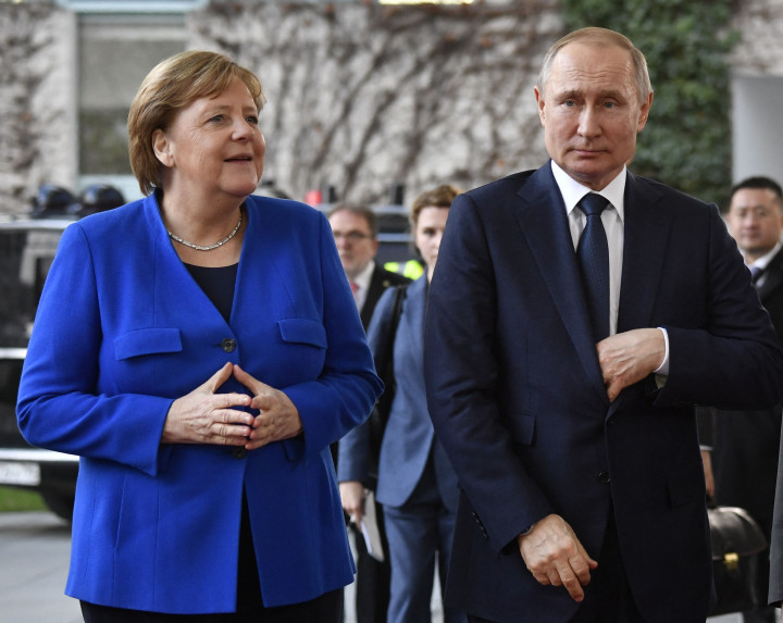 Angela Merkel és Vlagyimir Putyin 2020. január 19-én, Berlinben – Fotó: JOHN MACDOUGALL / AFP