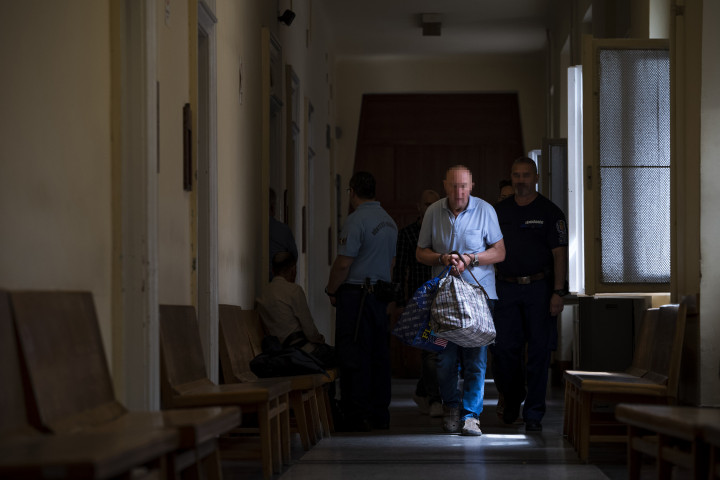 Az ukrán kapitányt kísérik a letartóztatásáról döntő bírósági tárgyalásra a Budai Központi Kerületi Bíróság Fő utcai épületében 2019. július 31-én – Fotó: Mónus Márton / MTI