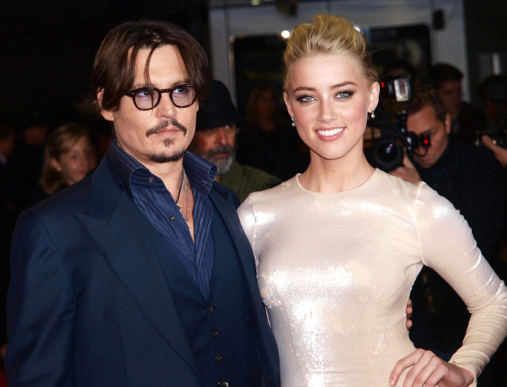 Johnny Depp és Amber Heard a Rumnapló díszbemutatóján 2011-ben – Fotó: MAX NASH / AFP