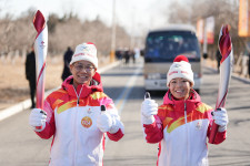Elindult a háromnapos olimpiai fáklyafutás Pekingben: robotok is váltanak, a lezárások miatt pedig nem lesznek nézők az utak mentén
