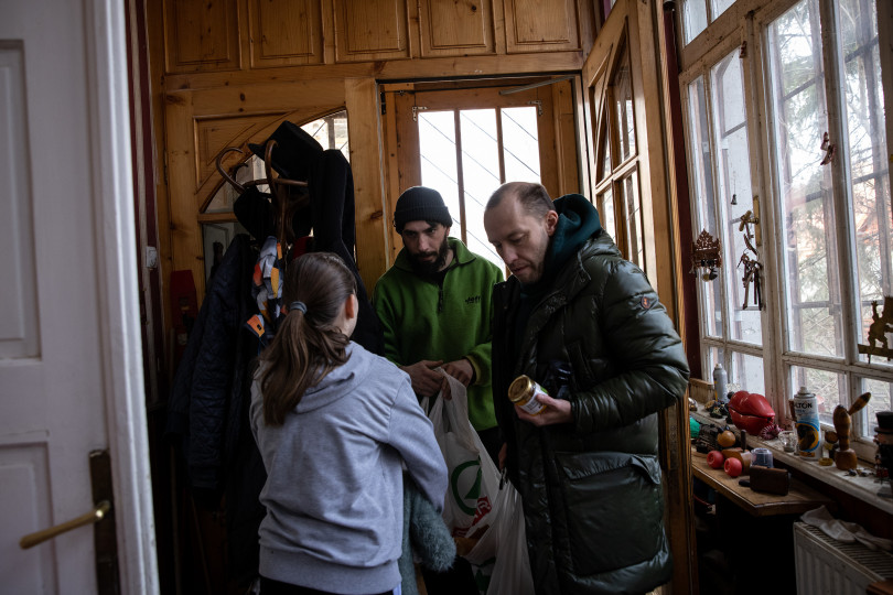 Everyone in the house contributes to the purchasing of groceries equally, and they share everything. 