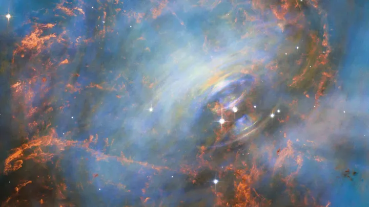 A Rák-köd szívében található központi neutroncsillag (a kép közepéhez közeli két fénylő csillag közül a jobb oldali); kép: ESA/Hubble & NASA