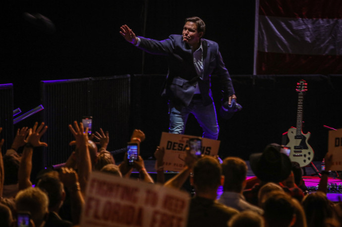 Florida Governor Ron DeSantis takes the stage during a 