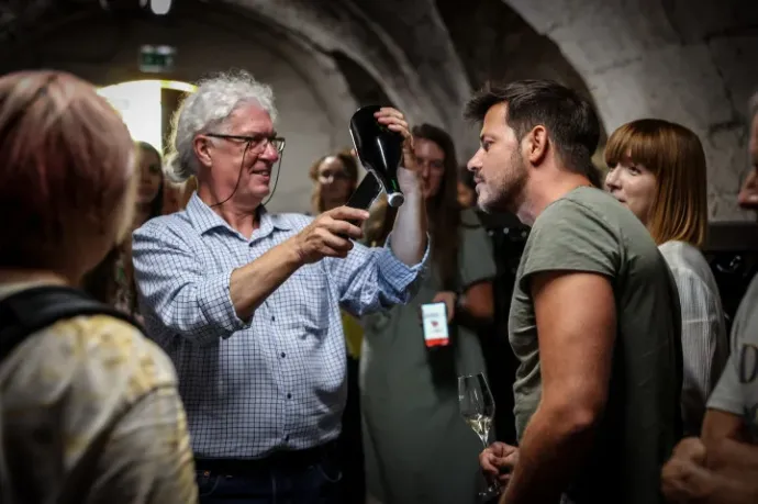 Examining sediment in the cellar – Photo: István Huszti / Telex