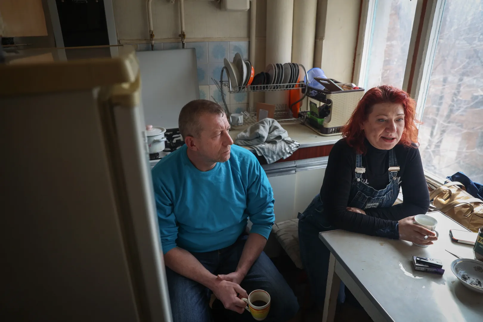 Oleg és Jelena egy Herszonhoz közeli faluban, majd Herszonban élték át a megszállást és a házkutatásokat. Digitális nyomok után kutattak az oroszok – Fotó: Huszti István / Telex