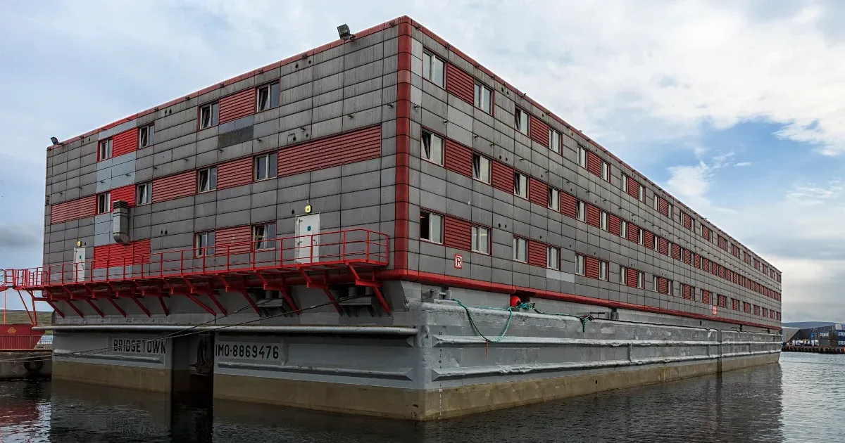 Asylum seekers are being housed in a huge floating container city off the coast of Great Britain