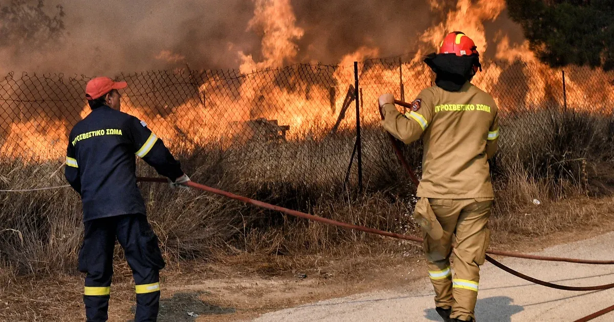 Forest fires are burning near Athens, and one of the vandals has been arrested