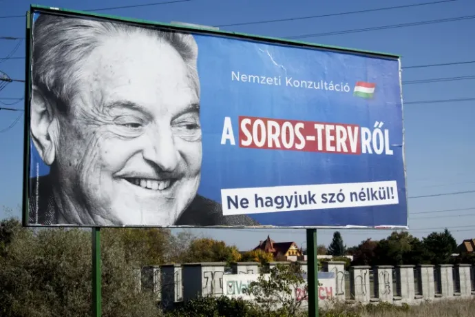A government poster in 2017 – Photo by Attila Kisbenedek / AFP