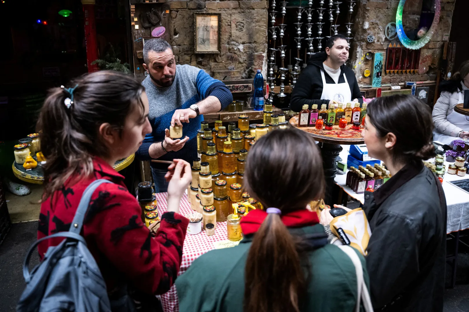 Beekeeper Krisztián Kisjuhász sells honey at a Budapest market in March 2024 – Photo: Márton Mónus / Reuters