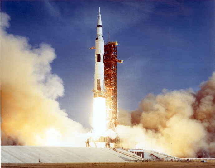 The Apollo 11 Saturn V space vehicle lifts off 16 July 1969 with astronauts Neil A. Armstrong, Michael Collins, and Edwin E. Aldrin aboard. Druing the eight day mission, Armstrong and Aldrin descended to the the moon for 22 hours, including 2 and 1/2 hours outside the lunar module, while Collins orbited overhead in the command module.  Armstrong and Aldrin gathered samples of lunar material and deployed scientific experiments before joining Collins for the return trip to Earth.  AFP PHOTO/NASA (Photo by Handout / NASA / AFP) / RESTRICTED TO EDITORIAL USE - MANDATORY CREDIT 