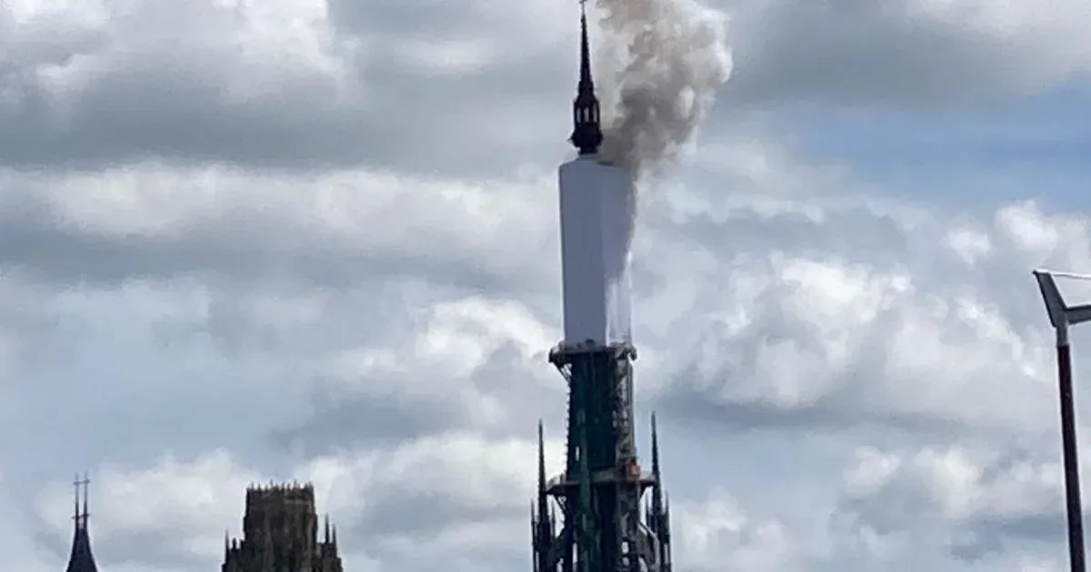 The tower of Rouen Cathedral, which was under renovation, caught fire.