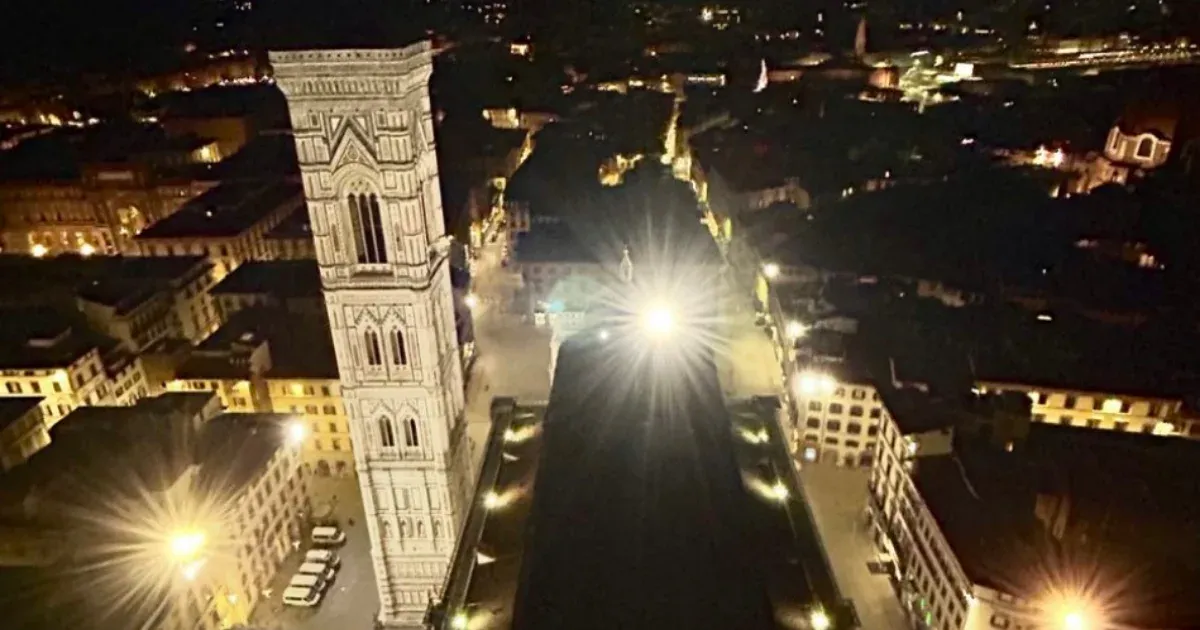 An Italian man takes a selfie on the dome of Florence Cathedral after closing time.