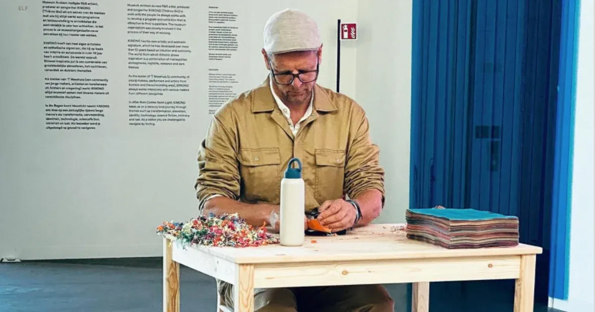 For six hours a day, a Dutch artist tears a UN climate report into tiny pieces with a punch.