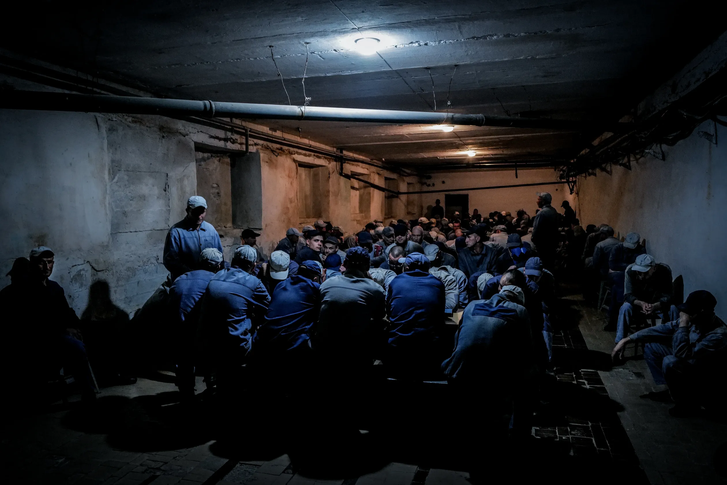 POW's in the air-raid shelter during a Russian attack on Ukraine – Photo: István Huszti / Telex