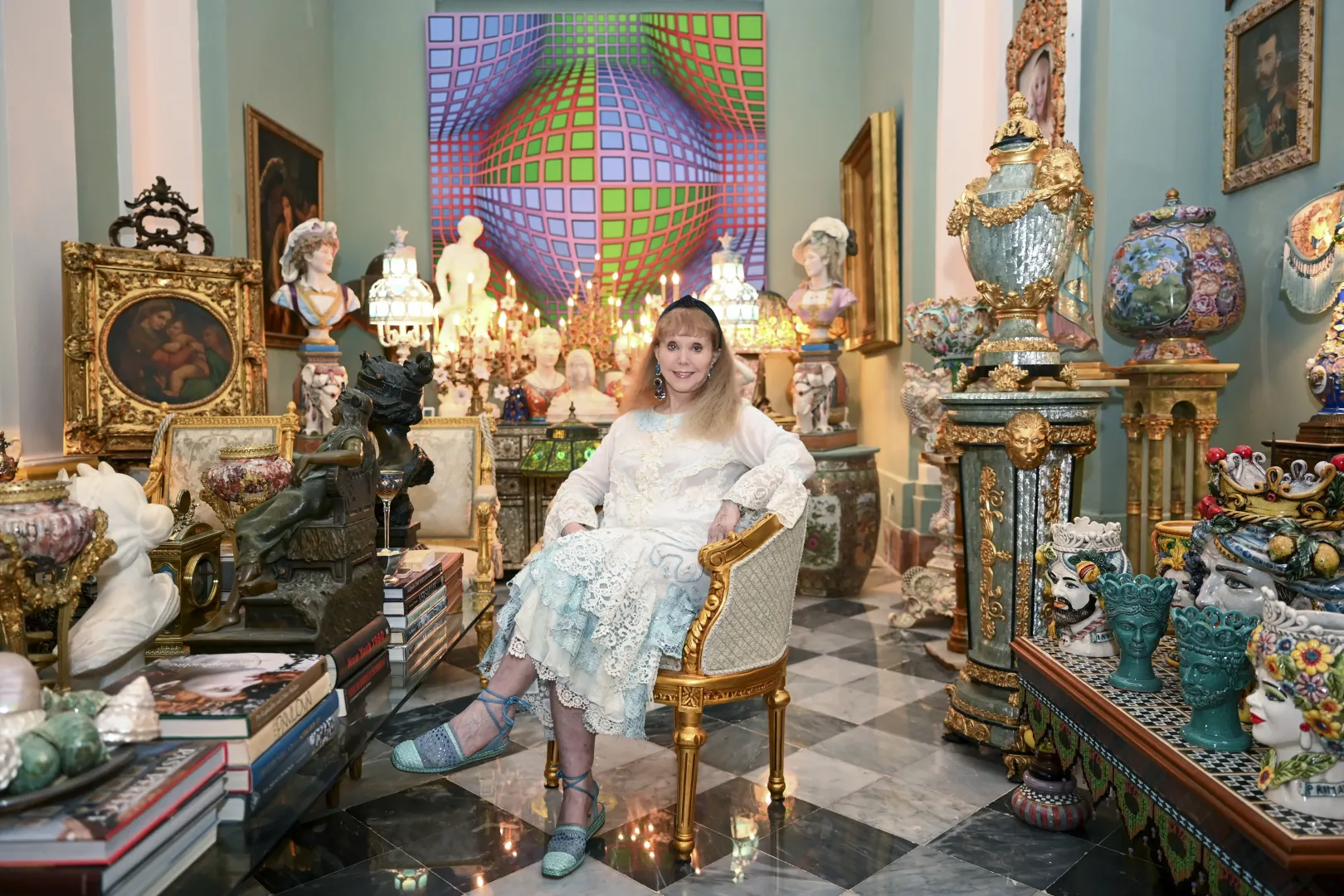 Michèle Taburno-Vasarely in front of her favorite Vasarely painting at her home in Puerto Rico – Photo: Noémi Napsugár Melegh / Telex