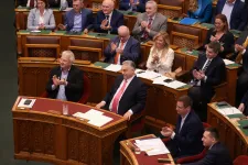 Russian-style law could bring surprise raids, fines for uncooperative banks and could create a network of informers