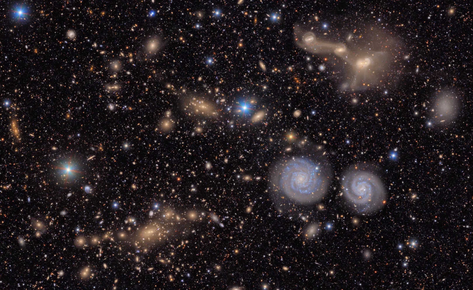 Spirálgalaxisok, három összeolvadó galaxis, közeli és távoli galaxiscsoportok, a Tejútrendszerünkön belüli csillagok és még sok más – Fotó: NSF–DOE / Vera C. Rubin Observatory