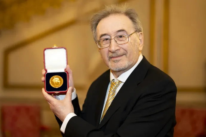 He walked to Buckingham Palace to receive a prestigious award for poetry from King Charles