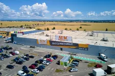 Az Indotek négy romániai Auchan-központ ingatlanját venné meg